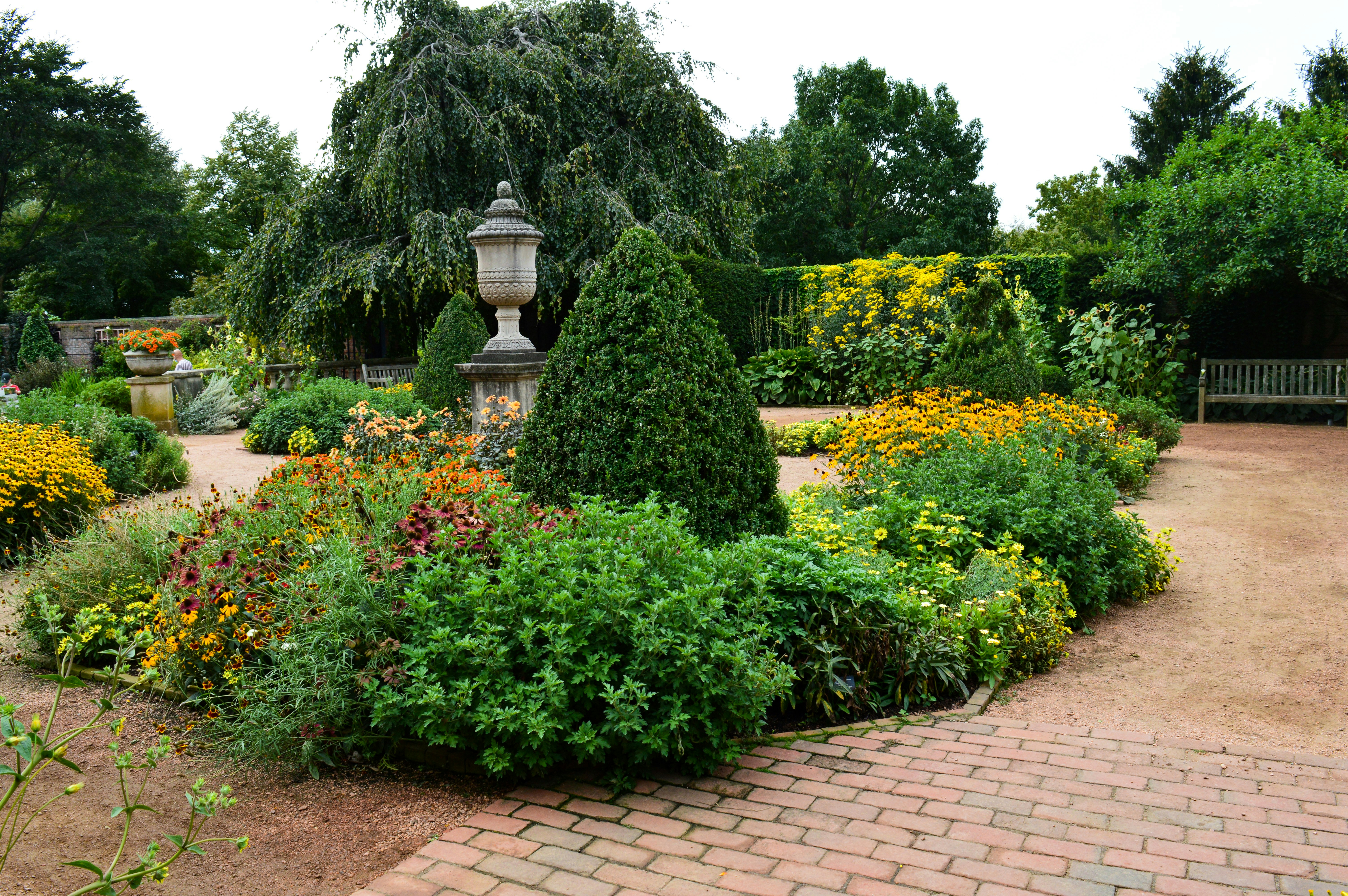 Fresh mulch beds with clean edging around perennial garden