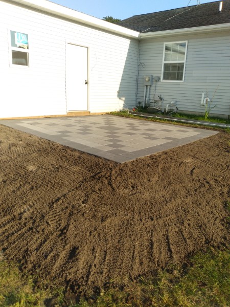 Paver patio with clean border and level surface